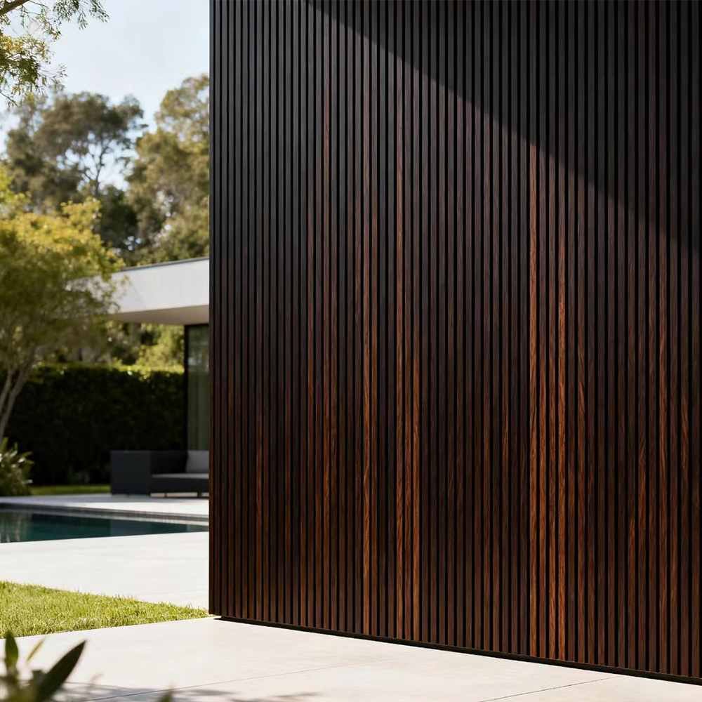 DecoGroove composite cladding — dark wall cladding installation by pool