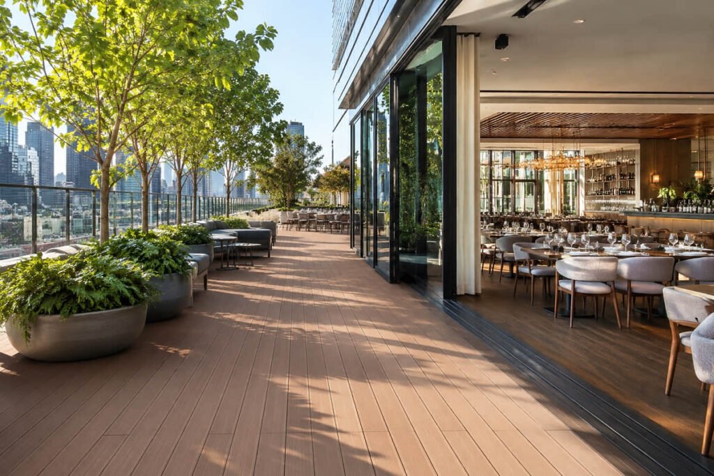 Composite Decking for Commercial Projects: Boardwalks, Restaurants and Public Spaces 1 commercial composite decking rooftop restaurant city view
