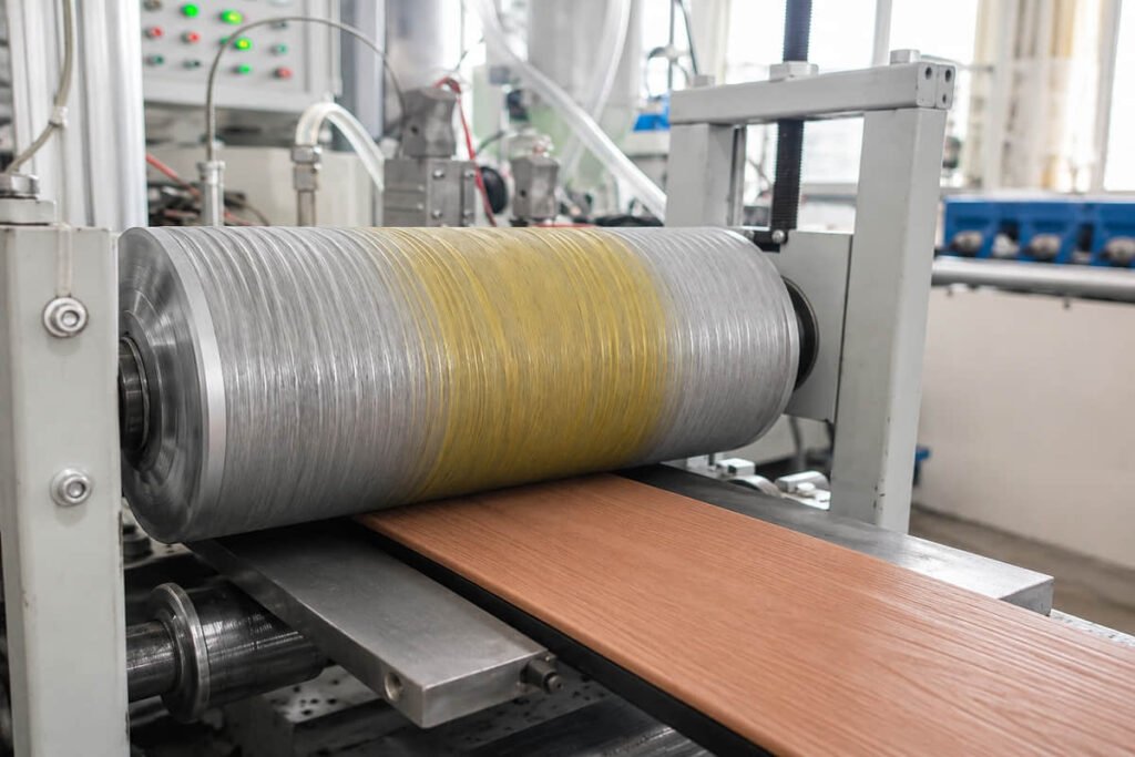 composite cladding manufacturing process embossing roller