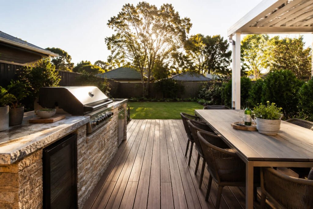 Outdoor kitchen and dining zone on composite decking