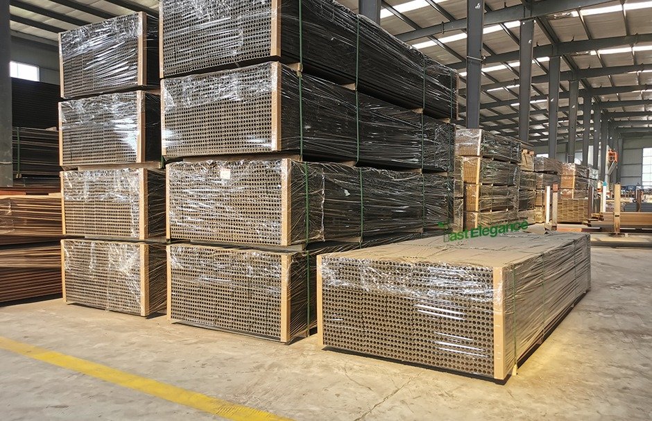 Stacked packaged WPC decking boards in warehouse