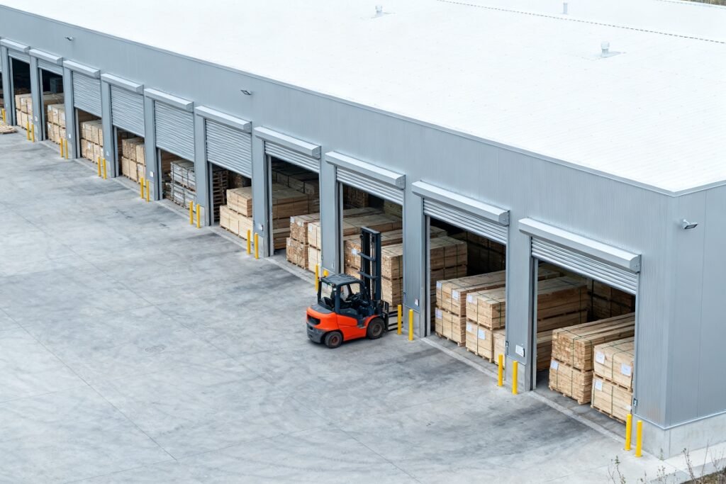 Composite siding supplier warehouse with forklift loading timber board pallets for distribution